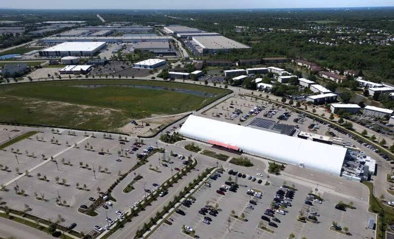 Aerial view of The Temporary by American Place and surrounding parking area