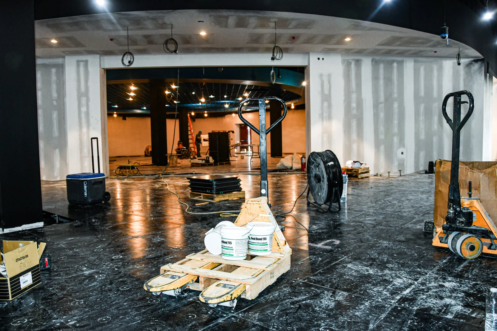 Raised flooring and staged materials during interior construction