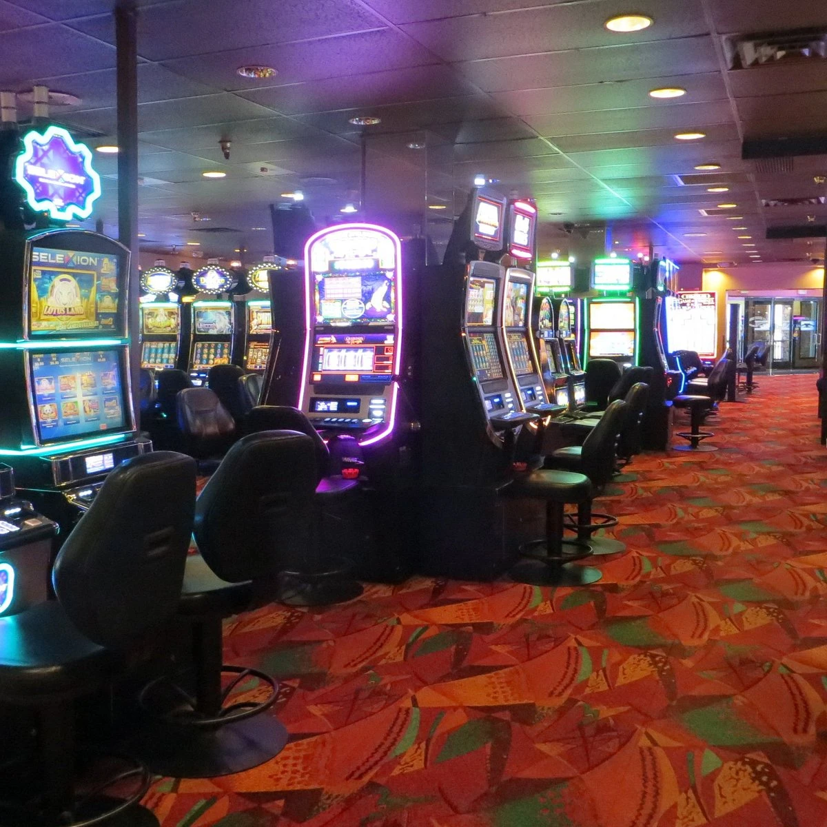 Ute Mountain Casino interior with slot machines and carpeted gaming aisles