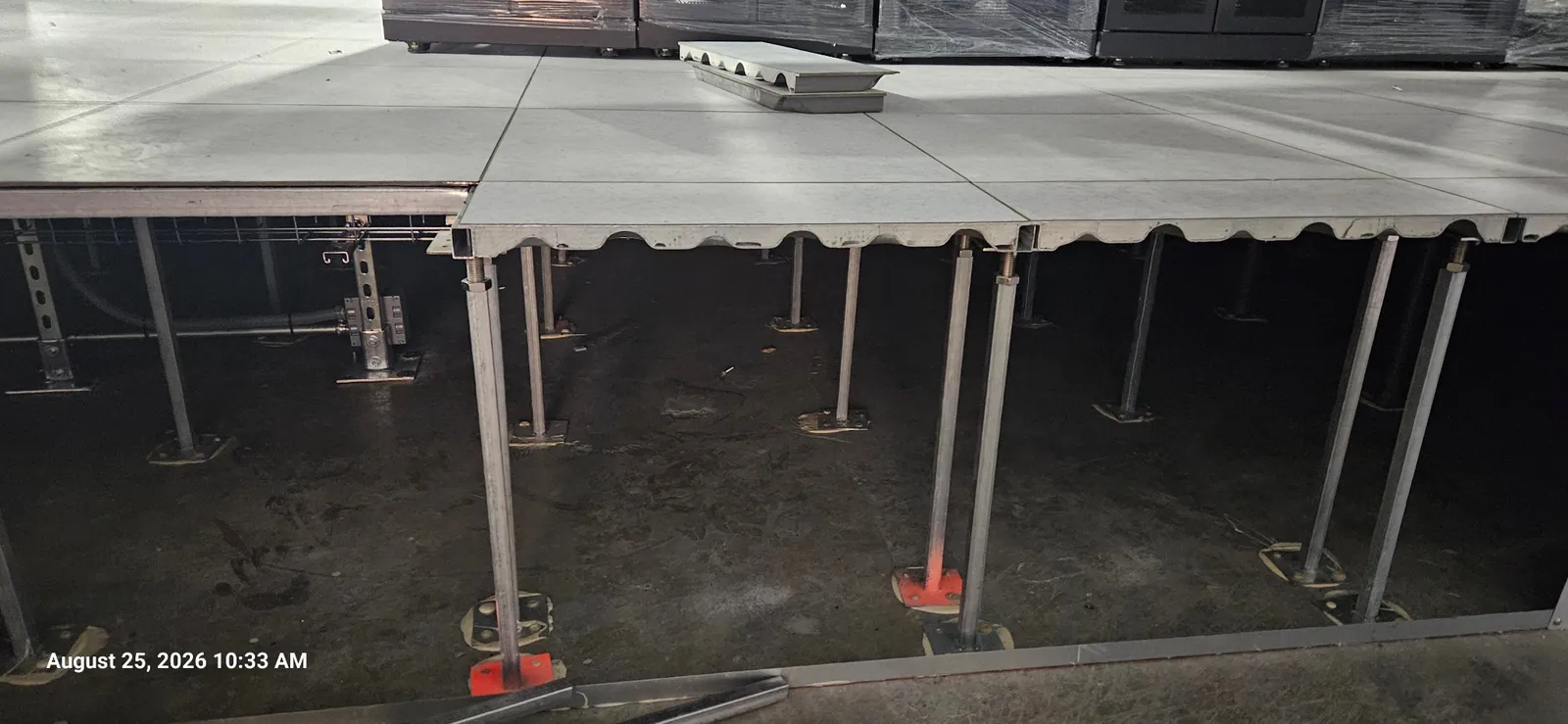 Raised floor pedestal understructure and underside of floor panels
